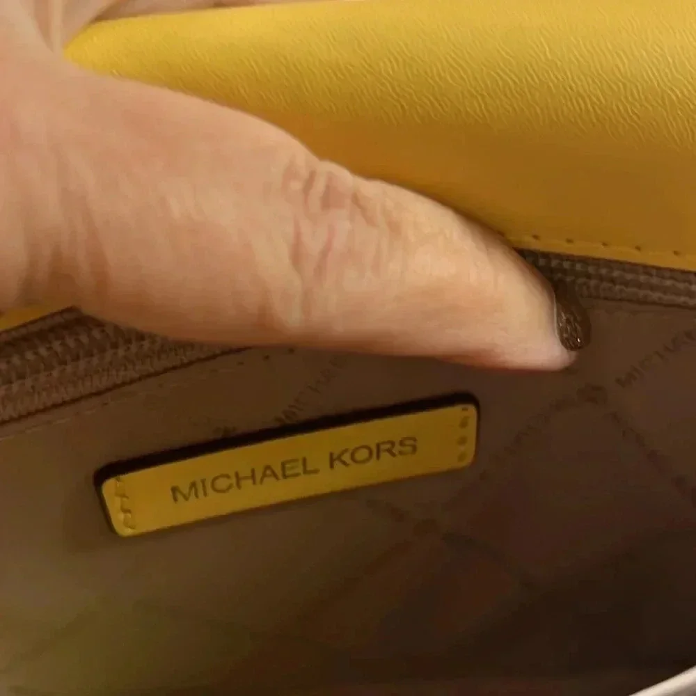- NWT beautiful yellow leather